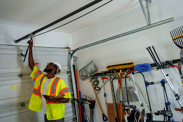 Professional Garage Door Installation technician working in Saranac Lake, NY
